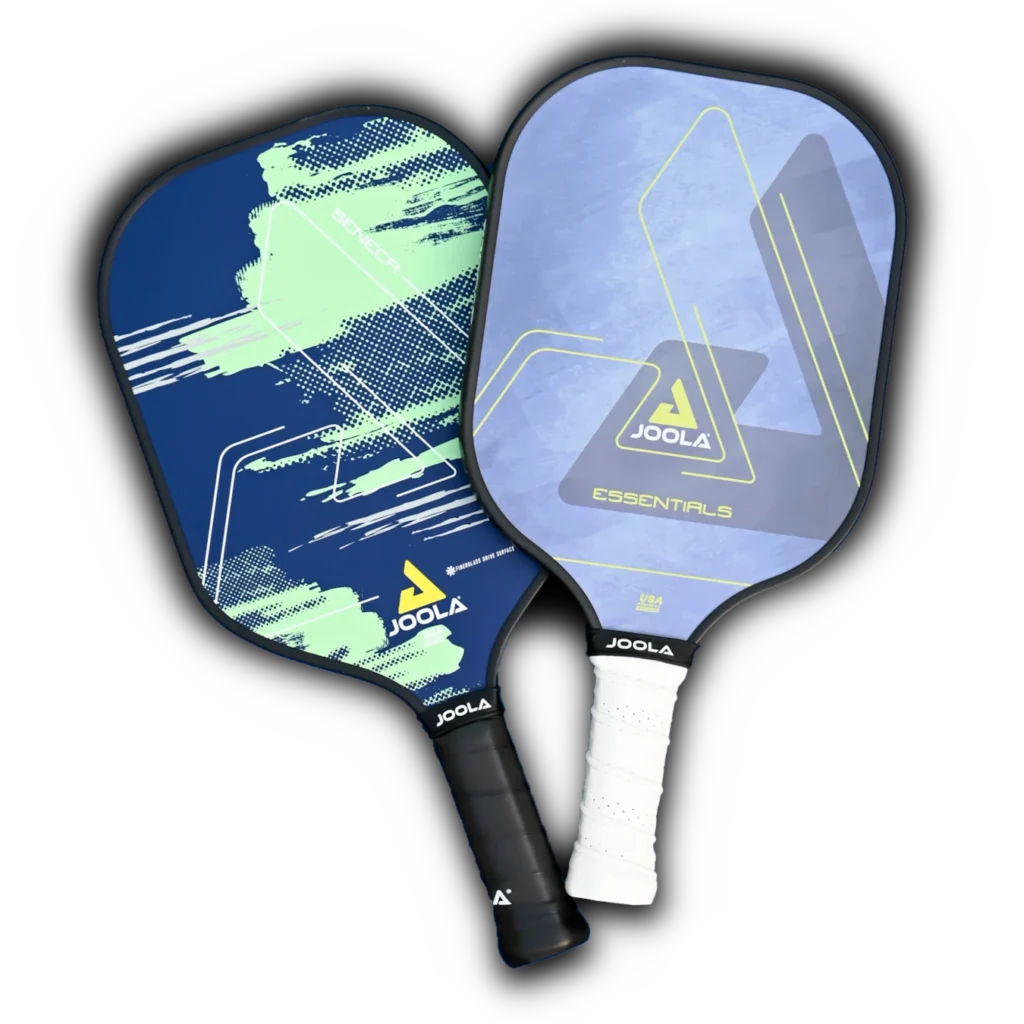 a pair of pickleball paddles with shadow